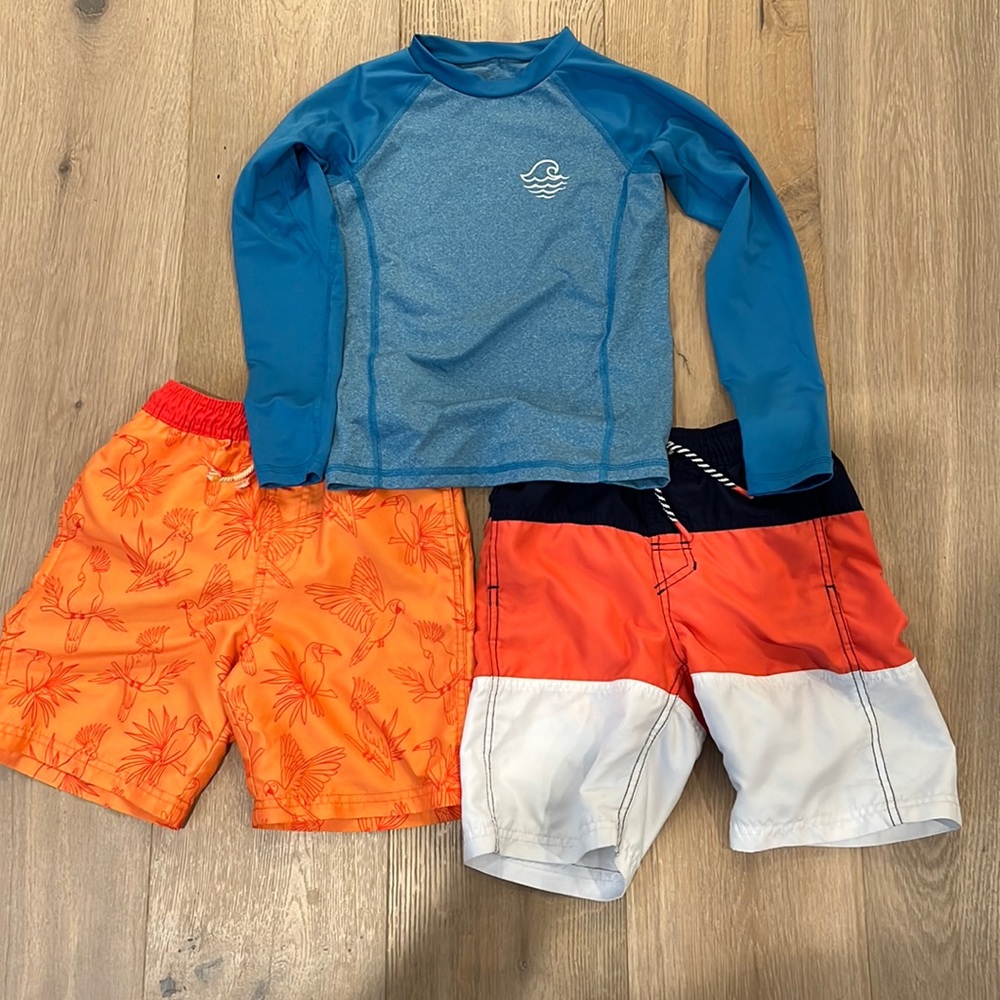 Lot of swim trunks and shirt